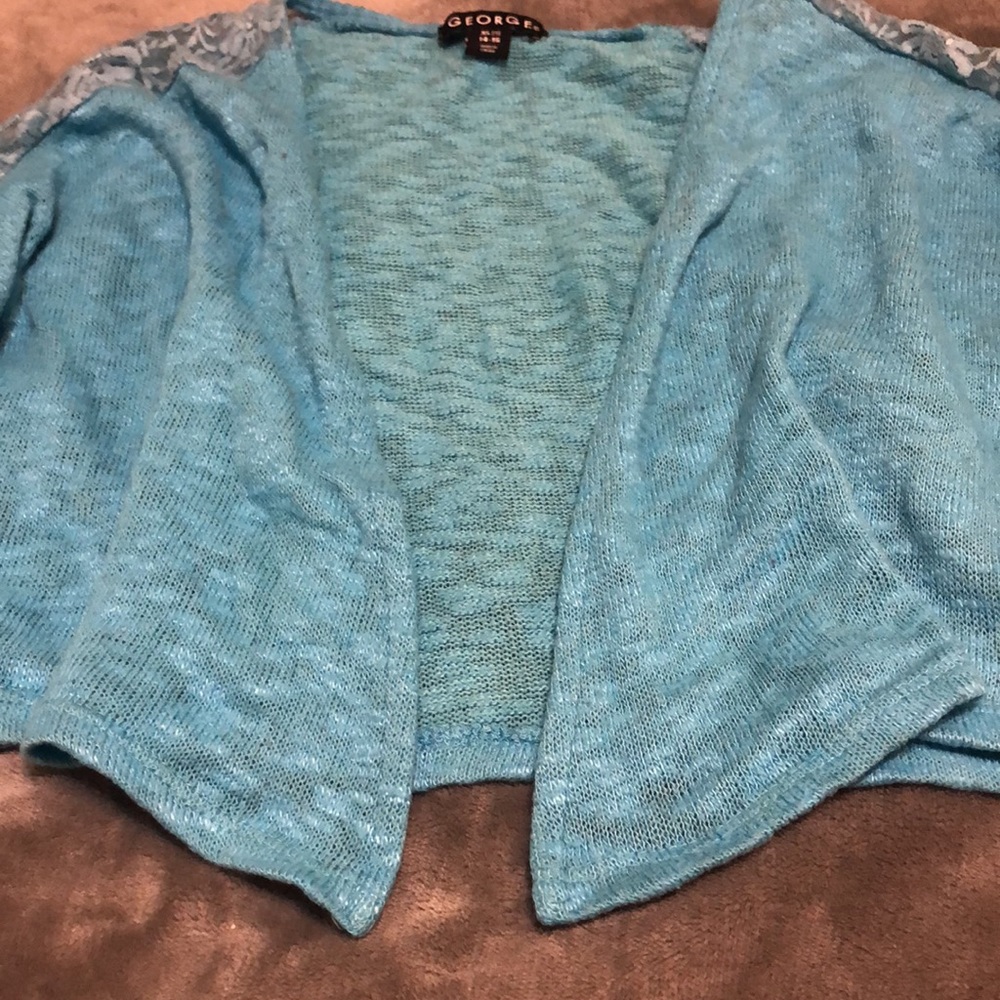 George shrug - Picture 2 of 4